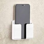 Wall Mounted Mobile Holder for Wall (Pack of 2) - Remote Control Storage Case, Multipurpose Phone Stand with Charging Hole for Home & Office, Adhesive Mobile Charging Holder (White) - Image 2
